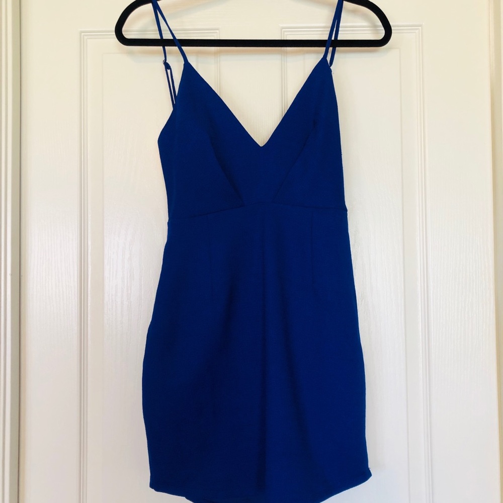 Cocktail dress with peplum back